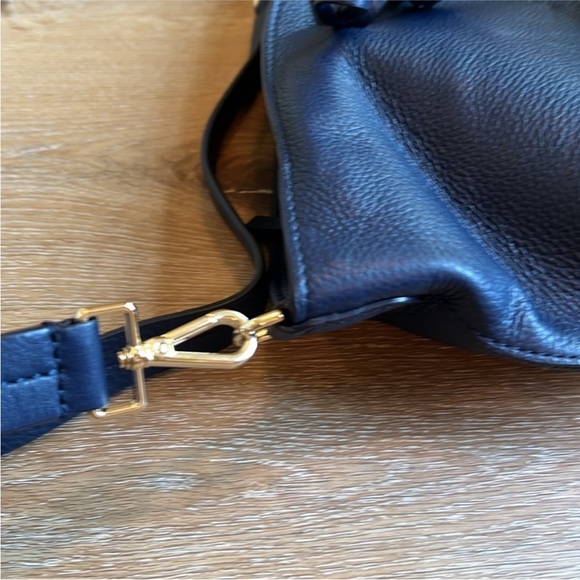 Kate Spade mini bucket bag. Never used. Missing tags but has care card. - Picture 11 of 11